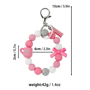 Nurse life silicone bead keychain with tassel and bow detail