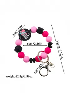Detailed view of silicone beaded keychain with dimensions and weight info.