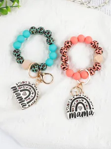 Detailed view of leopard print silicone beaded wristlet keychains with Mama pendant
