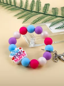 Detail of silicone beaded keychain with colorful beads and 'Wife MOM NURSE' charm.