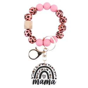 Stylish pink leopard print beaded wristlet keychain with Mama rainbow acrylic tag