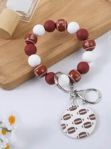 Llavero de pulsera con cuentas de silicona deportivas y colgante de fútbol americano