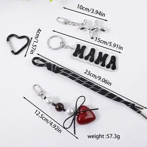 Σετ μπρελόκ MAMA καρδιά και ασημένιο σκυλί μπαλόνι με μαύρο πλεκτό κορδόνι κρέμασης