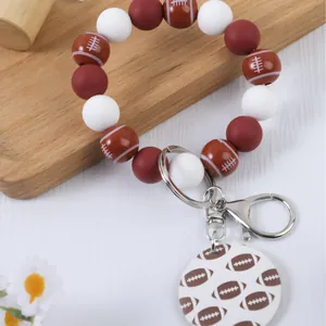 Pulsera llavero de cuentas de silicona con temática de fútbol americano deportivo