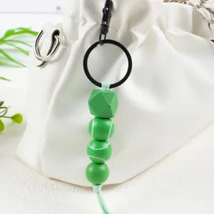 Llavero creativo hecho a mano de cuentas de silicona pelota de tenis para bolsos