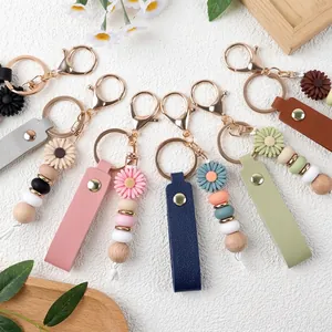 Süßer Gänseblümchen Schlüsselanhänger aus Silikonperlen Personalisierter Blumen Taschenanhänger Kunstleder Armband Holz Legierung Schlüsselring