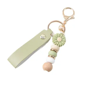 Gänseblümchen-Schlüsselanhänger mit Lederband und bunten Silikonperlen für Taschen