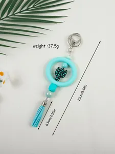 Llavero de silicona de cactus turquesa con borla y dimensiones de 22cm de longitud