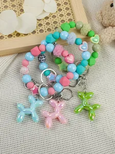 Set of cute colorful beaded wristlet keychains with iridescent balloon dog charms