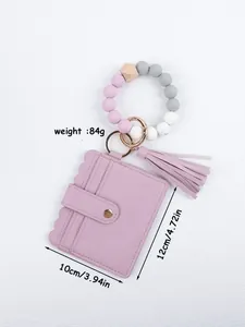 Beaded wristlet keychain with PU leather tassel card holder showing product dimensions.