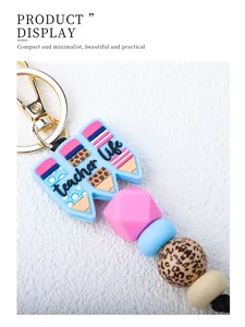 Vue détaillée du porte-clés crayon en silicone Teacher Life avec perles léopard