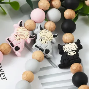 Kit de chupetero DIY con lindas cuentas de vaca de las tierras altas de silicona y madera