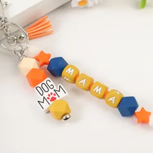 DOG MOM en MAMA siliconen kralen sleutelhanger met oranje kwastje en gekleurde sterren