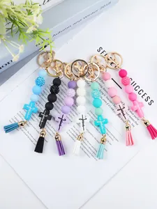 Silicone beaded keychains featuring Jesus cross pendant and matching tassel details