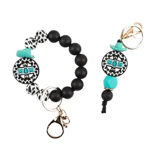 Elegante bracciale portachiavi in perline di silicone con cappello cowboy e perla 'MOM'