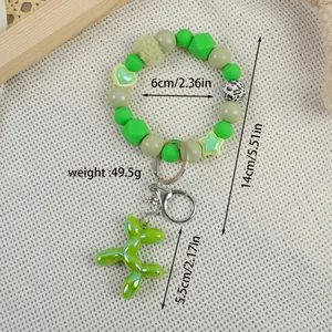 Green beaded bracelet keychain with lime green balloon dog charm for bag decoration
