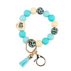 Leopard print silicone bead bracelet keychain with blue tassel and silicone mug charm decor