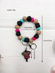 Vista detallada del llavero de pulsera de cuentas de silicona con dije Scrub Life