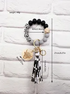 Western cow print silicone bead keychain size chart with highland cow engraved wood disc