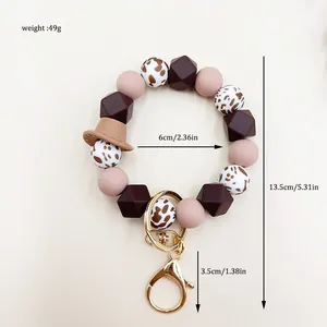 Vista dettagliata del bracciale in silicone stile western con cappello e dimensioni.