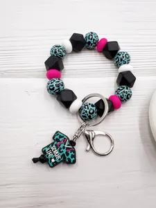 Llavero de pulsera de cuentas de silicona con dije 'Scrub Life' de enfermera