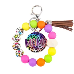 Vibrant colorful silicone beaded wristlet keychain featuring MAMA leopard pendant and tassel