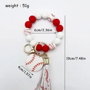 Llavero pulsera de cuentas de silicona rojo y blanco con dije de béisbol y borla