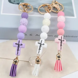 Creative silicone beaded keychains with Jesus cross and tassel in three soft colors