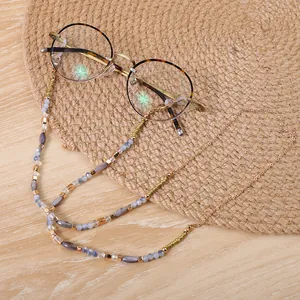 Elegante catenella per occhiali con perline leopardate e maglie in metallo dorato