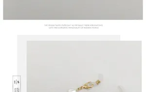 Detailansicht einer weißen Barockperle mit goldenem Karabinerverschluss für Brillen