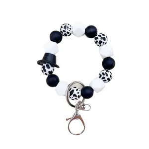Bracciale portachiavi in perline di silicone stile western con ciondolo cappello