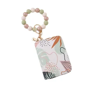 Bedrucktes Akkordeon-Kartenetui mit farbenfrohem Silikonperlen-Armband-Schlüsselanhänger
