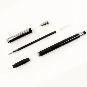 Penna a sfera professionale in metallo nero smontata con parti interne e ricarica