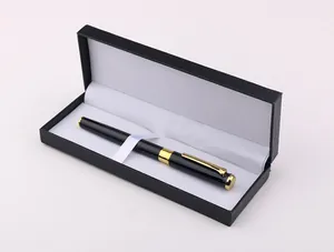 Detailed macro view of an elegant black metal business sign pen inside a premium gift box