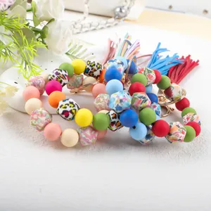 Colorful 14mm silicone octagonal and round bead bracelet keychain with stylish leather tassel