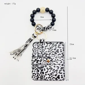 Tarjetero de pulsera de leopardo con cuentas de silicona y borla para llavero