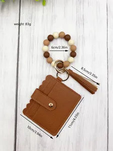 Dimensions of silicone bead bracelet keychain with brown PU leather wallet and tassel.