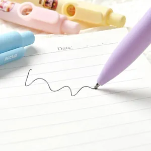 Pastel colored portable retractable gel pen writing on a white lined notebook page