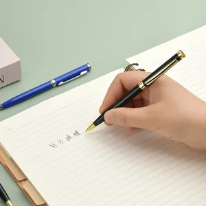 Premium metal ballpoint pen with gold trim for business meetings and office use.