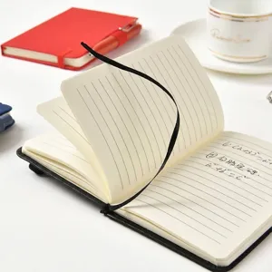 A6 pocket size PU leather notebook featuring a ribbon bookmark and lined Daolin paper for office