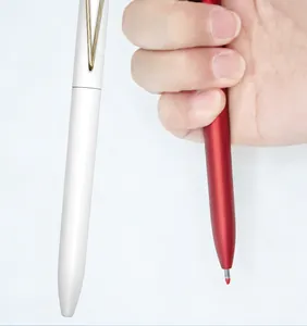 Detail shot of business gel pen with distinctive V-shaped metal clip held in hand