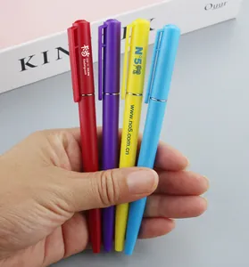 Detailed macro view showing a variety of colorful custom logo twist ballpoint pens