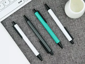 Macro view of professional minimalist metal ballpoint pens in teal, black and white finishes