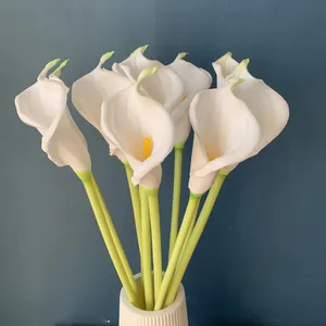 Elegant white PU artificial calla lily flowers in a white vase for home decoration
