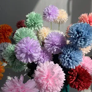 Close-up of colorful artificial pompon chrysanthemum flowers with realistic texture