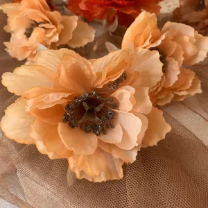Close-up detail of artificial peach peony flower head for wedding decoration
