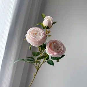 Close-up detail of realistic pink 3-head artificial silk rose for home and wedding decor
