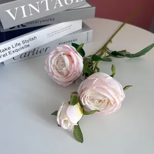 Close-up detail of 3-head artificial pink silk roses for elegant home and wedding decor