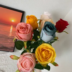 Close-up of colorful Bulgarian simulation roses for home and hotel table decoration