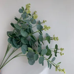 Detailed close-up of realistic 16-fork artificial eucalyptus branches with silk leaves.